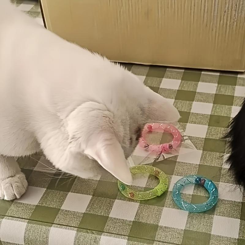 Самоиграющая игрушка для кошки. Мягкая трубка для кошек в форме пончика со звуком колокольчика, Прыгающая пружинная игрушка для кошек, Без батареек