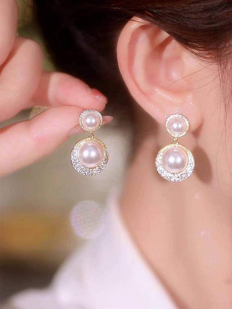 Серебряные серьги-кисточки с жемчугом и иглами - модные универсальные женские украшения