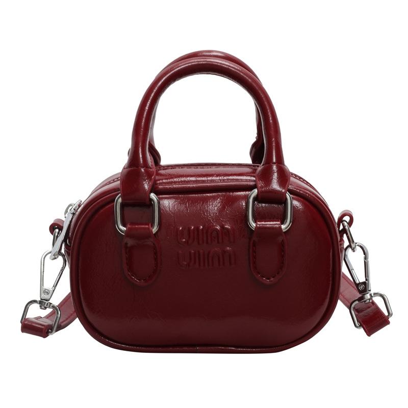 2025 новая маслянистая мини-сумка нишевая сумка для помады кроссбоди родительско-детская маленькая сумка-боулинг женская сумка