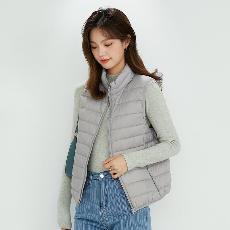 UUYUYI light and thin stand-up collar down vest women's autumn and winter warm simple vest white duck down wear versatile coat