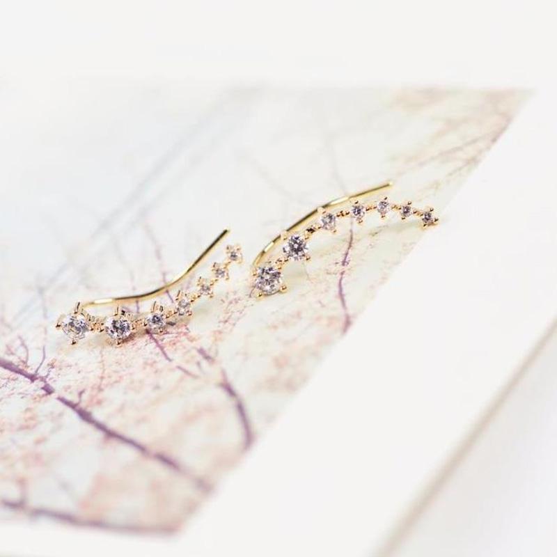 Серьги-гвоздики с бриллиантами Ряд 7 Серьги-гвоздики со звездами и инкрустацией бриллиантами и стразами