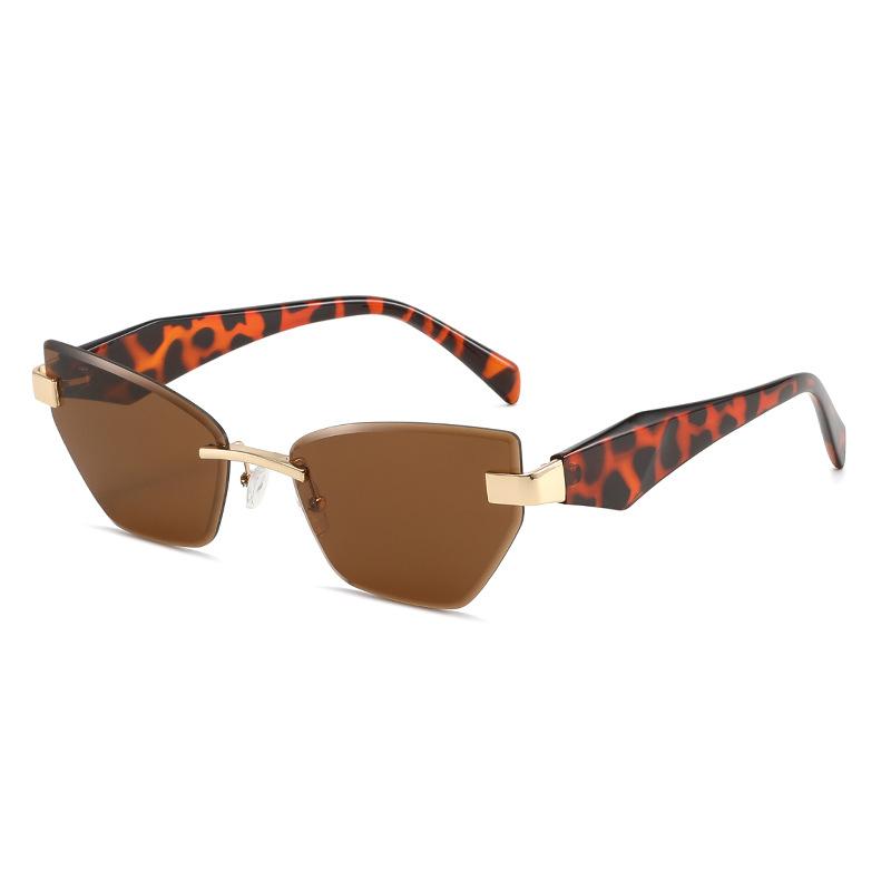 New irregular European and American sunglasses women's tide frameless sunshade outdoor travel street cat eye sunglasses