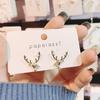 Pearl and Antler Crystal Christmas Earrings