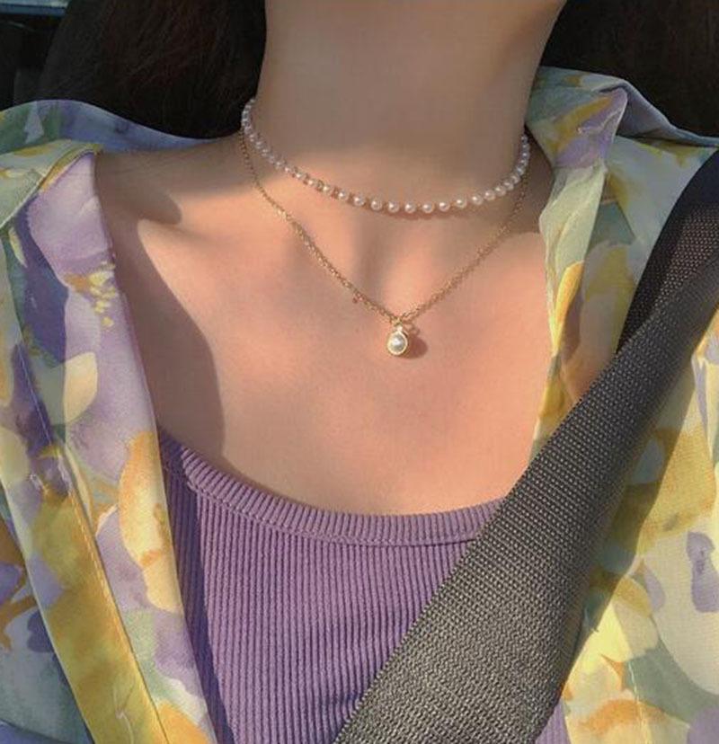 Сказочное жемчужное ожерелье: Многослойная, универсальная цепочка на ключицу для свежего, женственного образа.