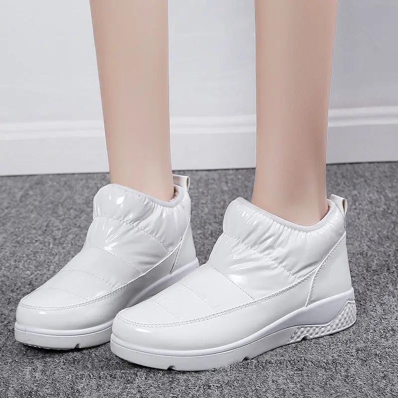 Модные женские зимние ботинки обувь белые низкие ботильоны до щиколотки зима 2024 короткие ботинки-дутики водонепроницаемые меховые пушистые туфли для женщин черные серебристые