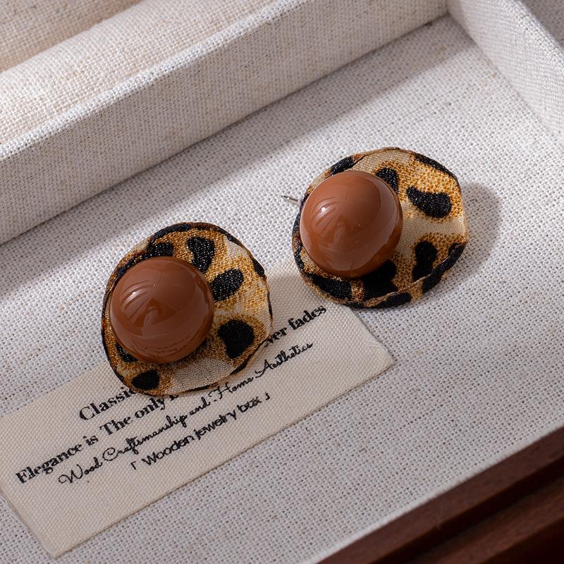 Модные серьги-подвески для женщин