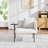 Modern single armchair with comfortable fabric backrest and two storage compartments, complemented by a practical side table.