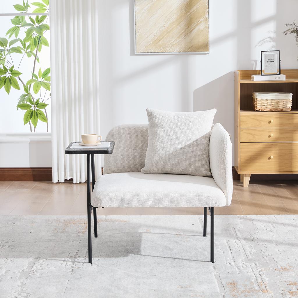 Modern single armchair with comfortable fabric backrest and two storage compartments, complemented by a practical side table.