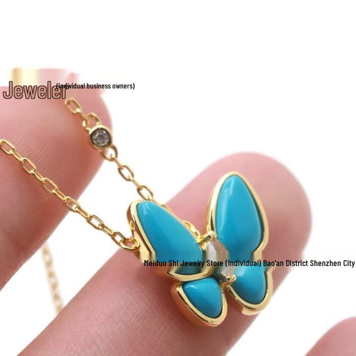 Серебряное колье 925 пробы с синим бирюзовым кулоном в виде бабочки с позолотой 18 карат и цепочкой на ключицу