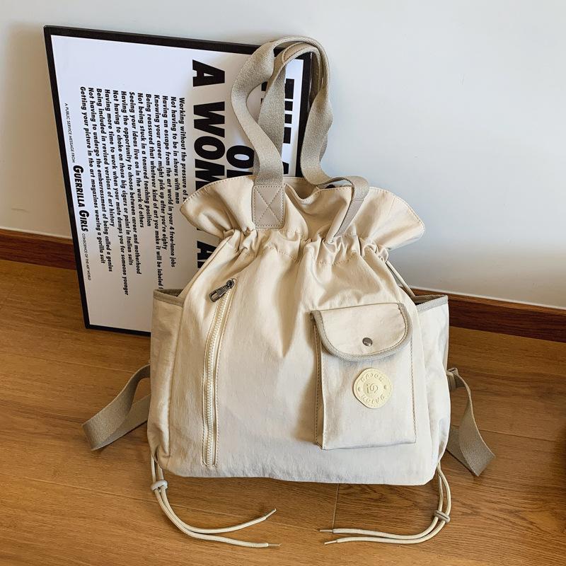 Сегодняшние популярные сумки, новые летние плиссированные нишевые сумки через плечо, универсальные сумки-ведра мессенджеры