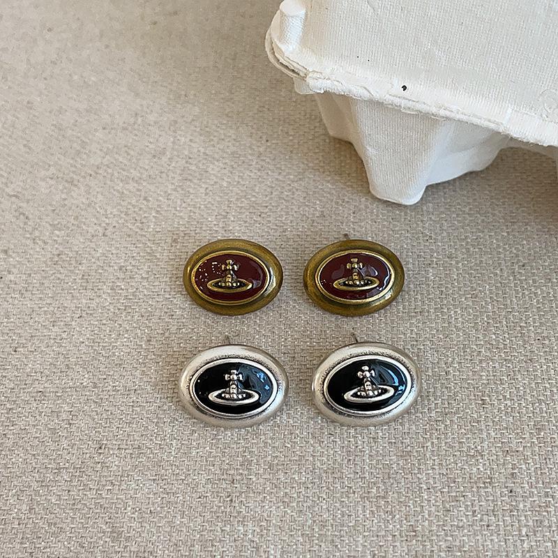 Medieval Style Oval Metal Oil Drop Planet Earrings for Women - Niche Design, Fashionable, Versatile.