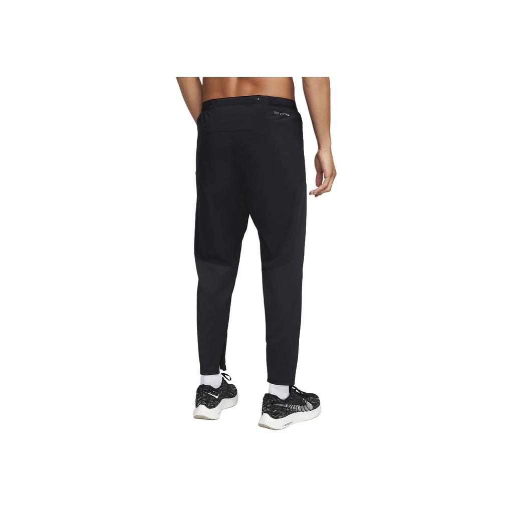 Nike Спортивные брюки Dri-Fit с принтом из нескольких логотипов, свободного кроя, с манжетами, мужские, черные FN3362-010