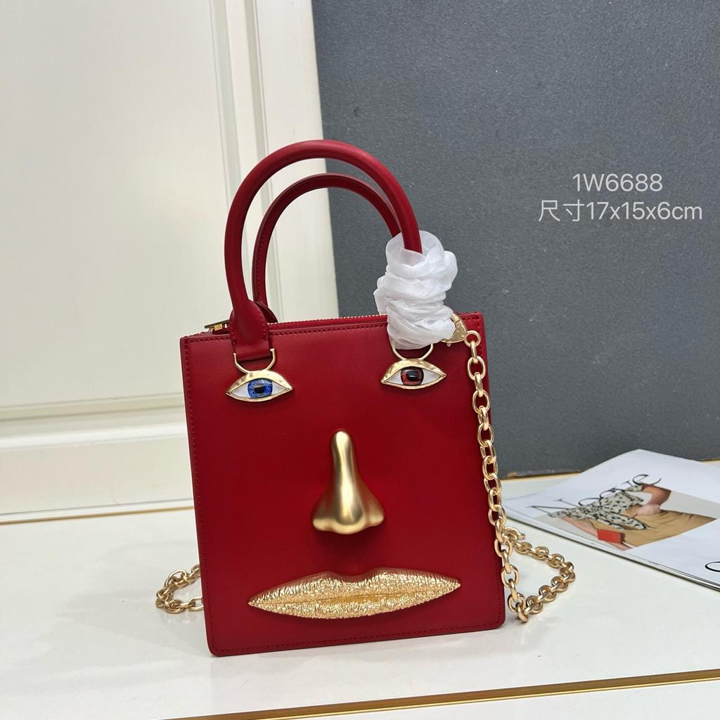26 trendy new schiap face women's bag plain weave cowhide chain design sense hand-held tote bag