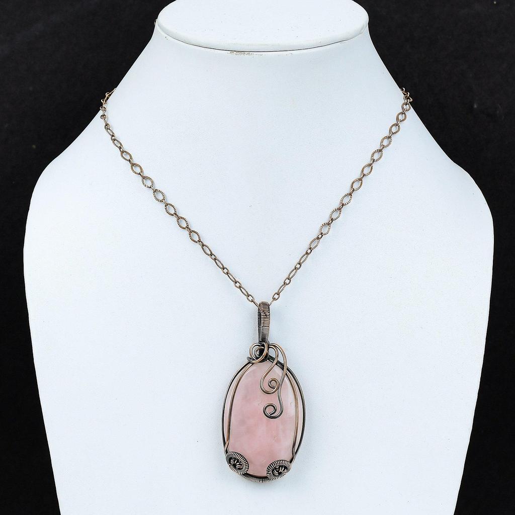 Розовый кварц Драгоценный камень Чистая медная проволока Обернутая ювелирная подвеска ручной работы