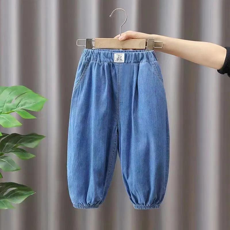 Джинсы для мальчиков Универсальные повседневные брюки Детские брюки Брюки Весенние и осенние повседневные брюки Свободные джинсы с принтом