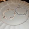 Sweet light luxury zircon flower geometric bracelet fashionable and exquisite temperament adjustable versatile bracelet.