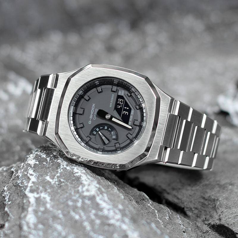 Casio Унисекс Серия с двойным жидкокристаллическим/аналоговым дисплеем Черные часы GA-2100-1A1(Watch4--)