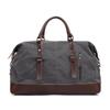 Unisex Large Capacity Canvas Travel Bag: Convertible Handbag, Shoulder Bag, Crossbody & Luggage for Casual Use.