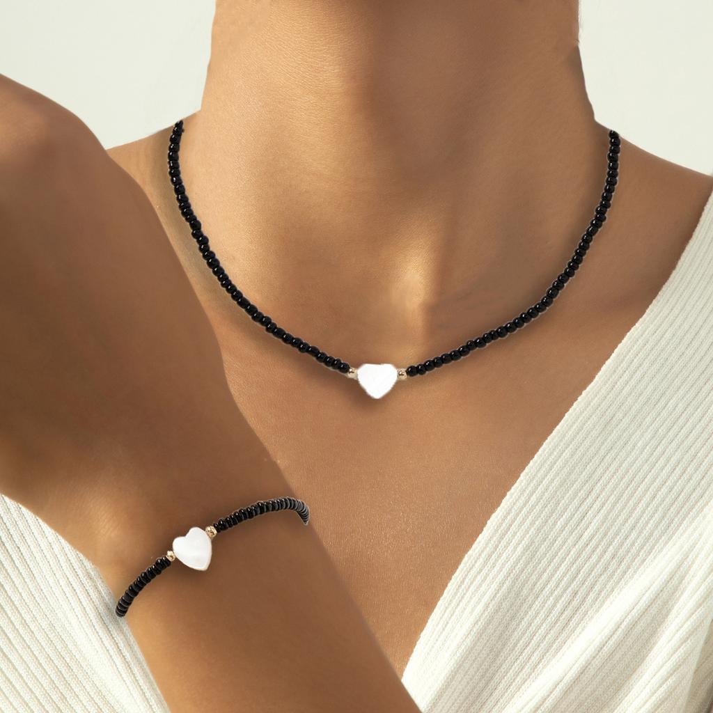 European and American black rice beads, white water flow pattern fritillary love bracelet, necklace set, versatile Valentine's Day jewelry.
