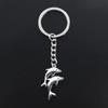 Fashion Keychain 32x22mm Double Dolphin Show Silver Color Pendants DIY Men Jewelry Car Key Chain Ring Holder Souvenir For Gift