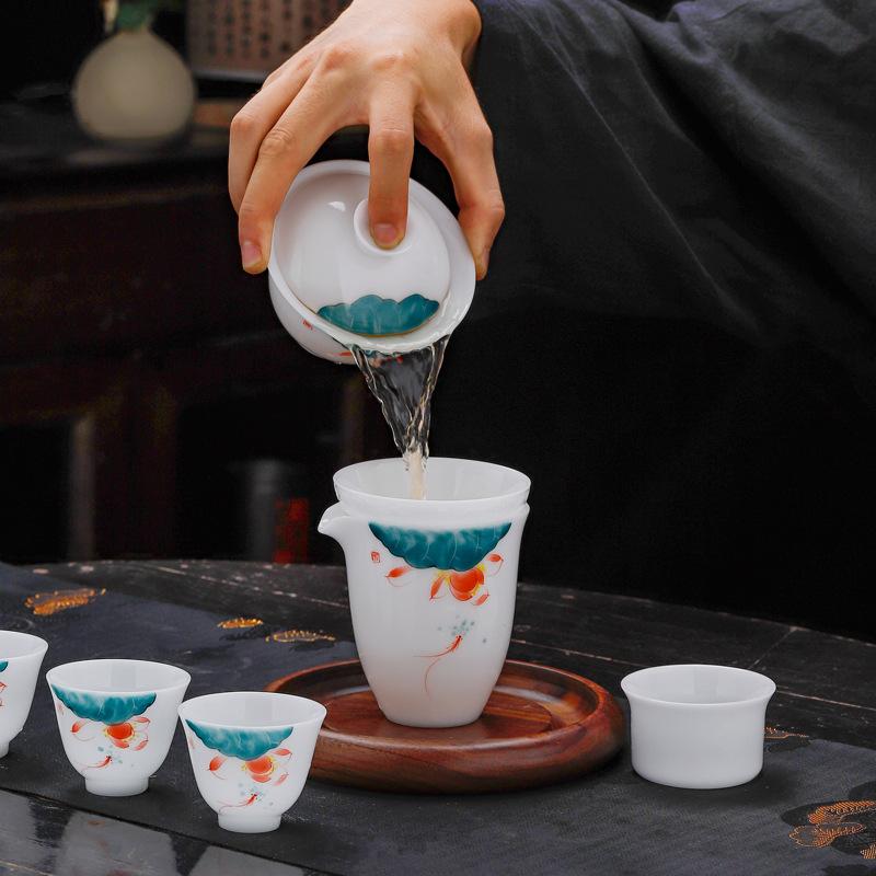 Dehua ice Jade Porcelain Hand-painted Lotus Kung Fu Tea Set Household High-end Teacup Complete Set Cover Bowl Gift Set