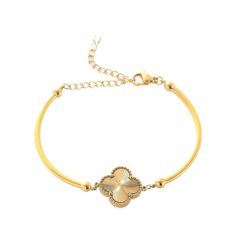 Элегантный золотой женский браслет и колье в виде четырехлистного клевера