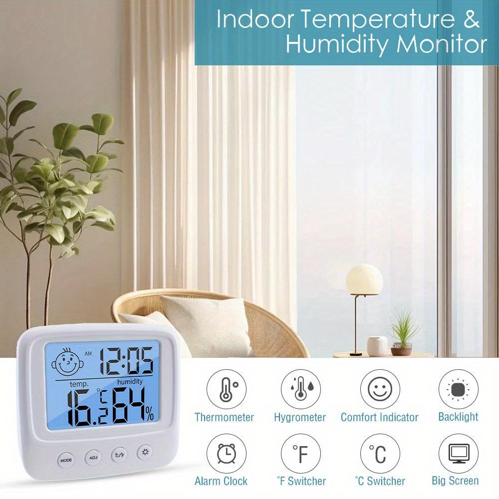 Indoor thermometer and hygrometer with clock, digital temperature and humidity monitor, backlit, Celsius/Fahrenheit display, battery powered.