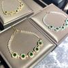 Браслет Versa Simulation Jewelry с микро-вставками зеленых бриллиантов, покрытие белым золотом, разноцветный, ручная работа, женский