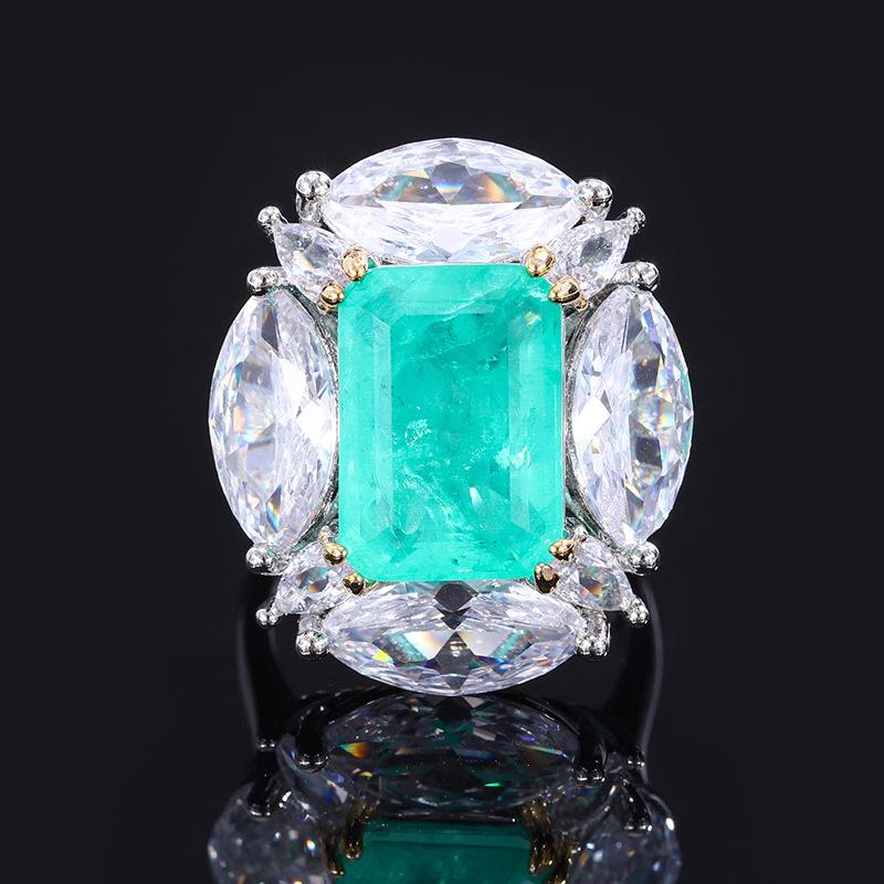 Легкое роскошное цветное кольцо-сокровище высокого класса Параиба с преувеличенным бриллиантом в форме голубиного яйца, слегка украшенное модными бриллиантами с высоким содержанием углерода