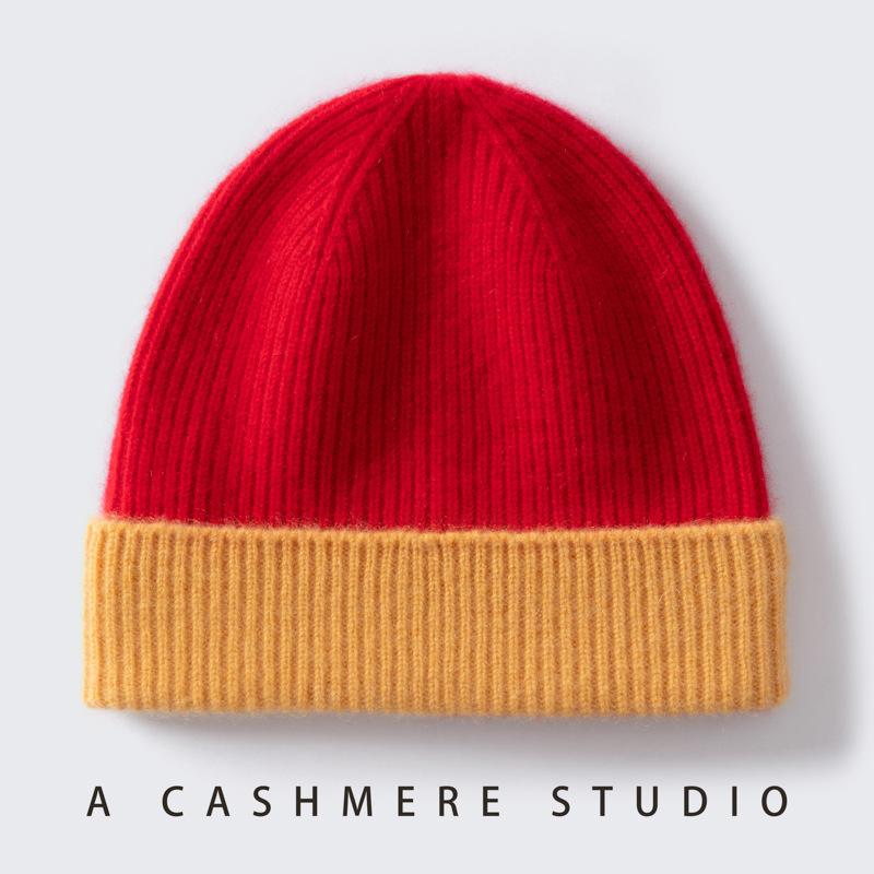 Autumn and winter new children's% pure cashmere hats for boys and girls with color matching knitted warm windproof ear caps