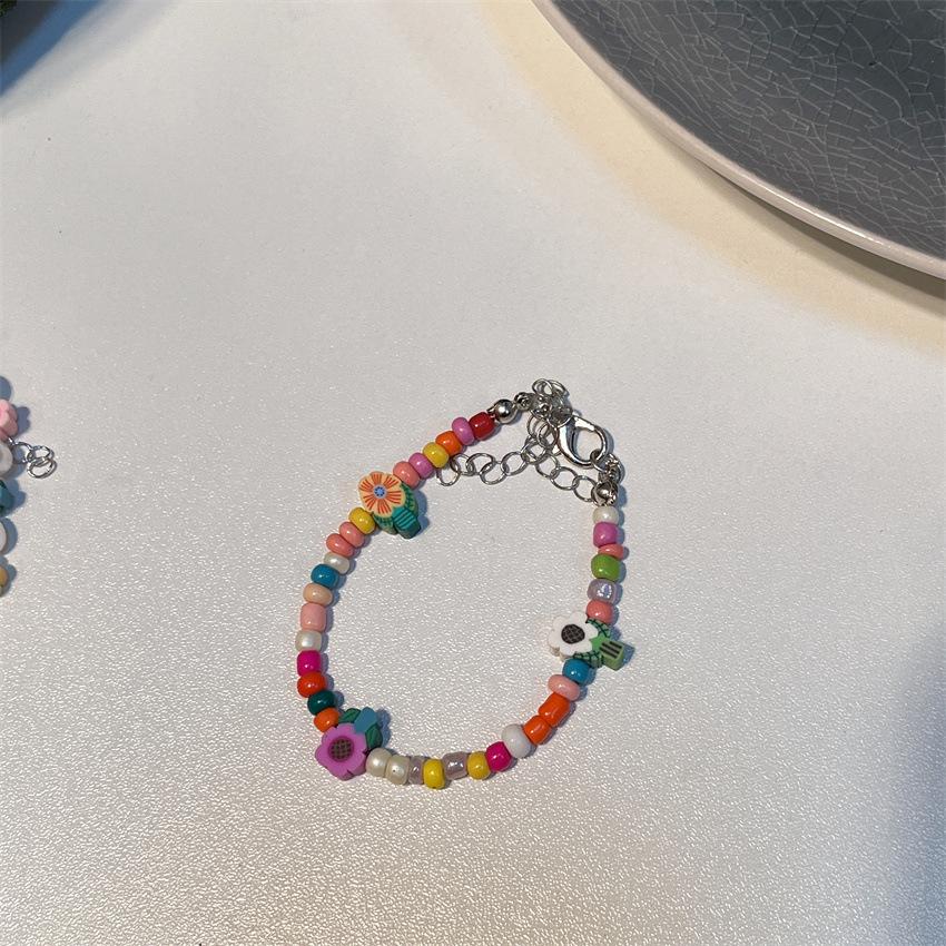 Новый красочный браслет с цветком, браслет в милом девичьем стиле, регулируемый браслет в форме жемчуга, универсальная ручная одежда