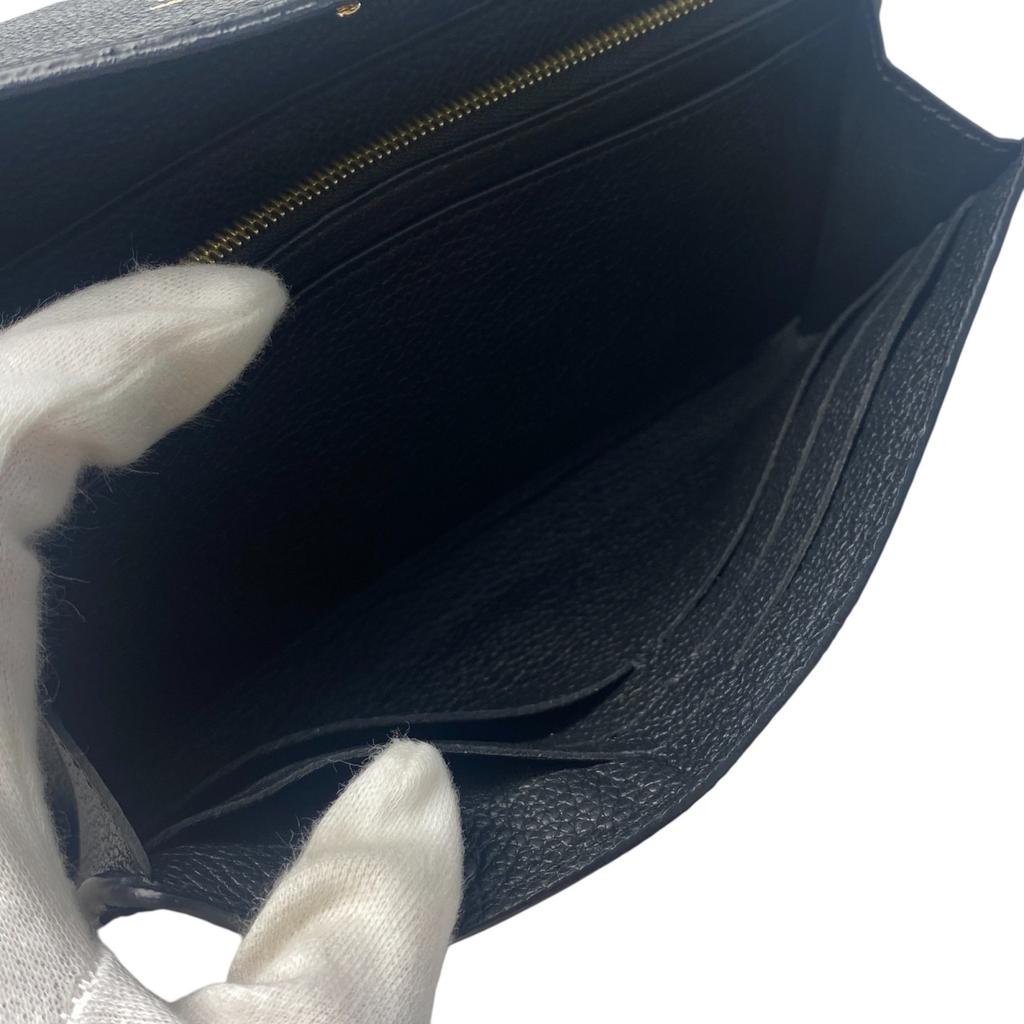 Подержанный кошелек LOUIS VUITTON Серия Black/Кремовый тип кожа Женский