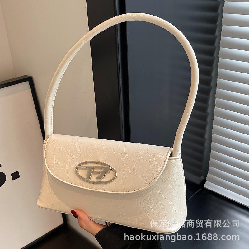 Французская нишевая маленькая сумка женская сумка 2025 новая модная модная с высоким чувством иностранного стиля осенне-зимняя на одно плечо подмышечная сумка-багет