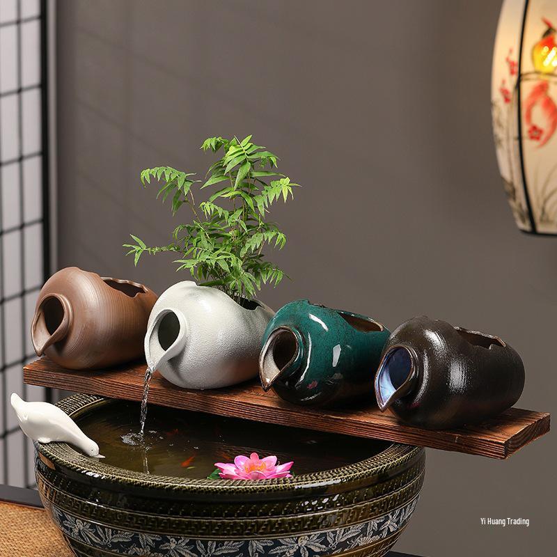 Ancient Method Fish Ecosystem: Flowing Water Pottery Jar with Open Circulation for Creative Landscaping and Balcony Décor.
