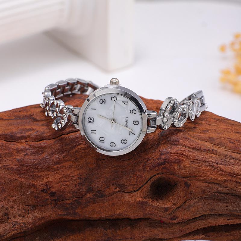 Новые женские кварцевые наручные часы из сплава с браслетом в виде крыльев, полностью инкрустированных бриллиантами