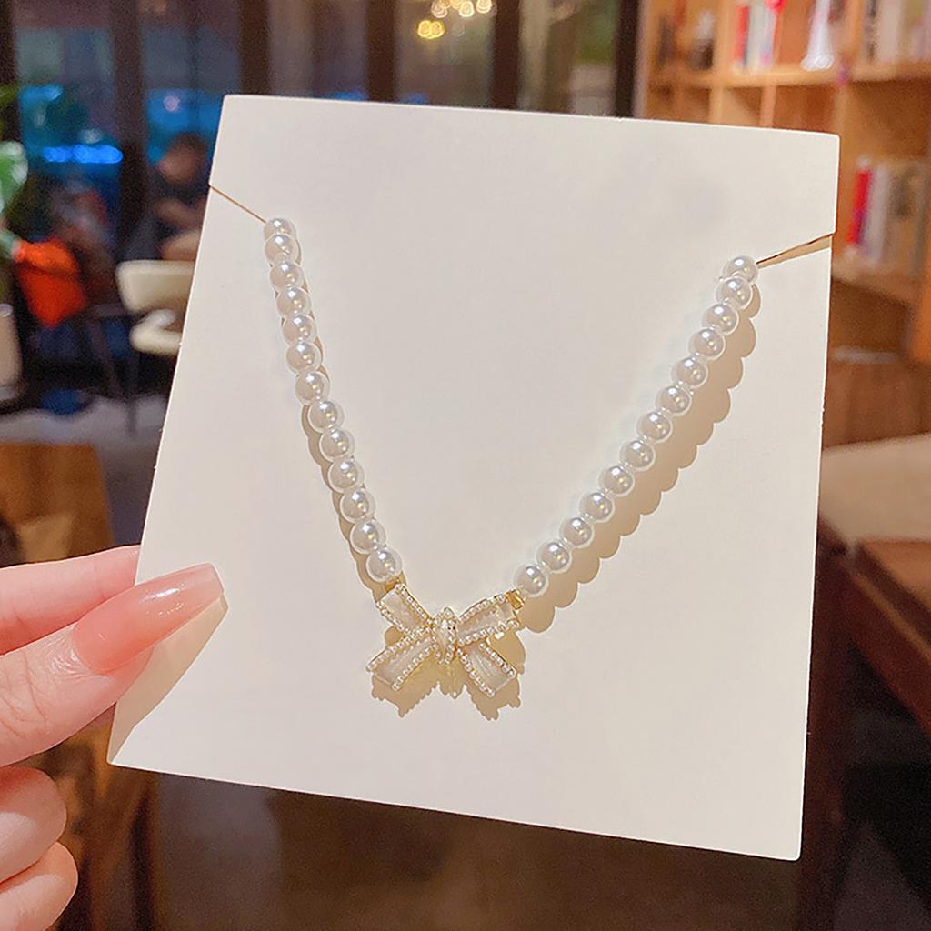 Elegant Adjustable Pearl Necklace Bowknot Pendant Necklace Fashion Neck Jewelry Present for Stylish Women Fashion Lover