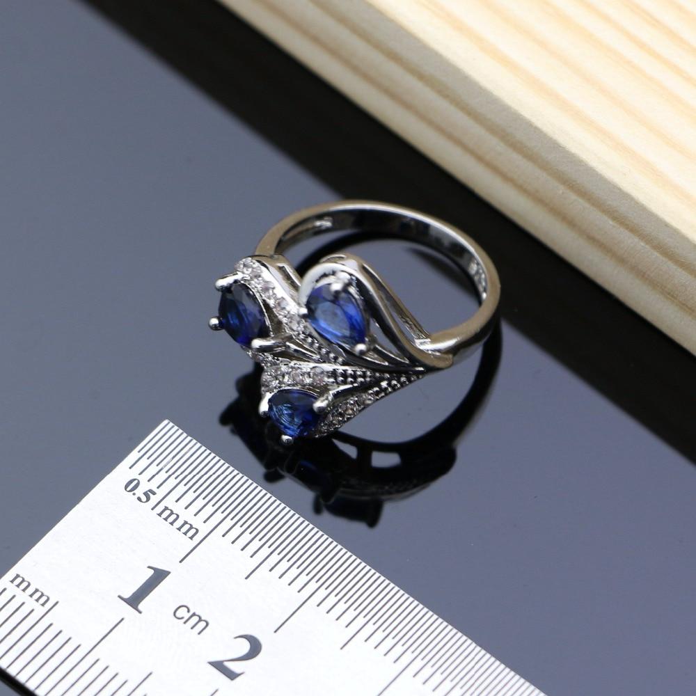 Серебристый ювелирный комплект с синими кристаллами: браслет + ожерелье + серьги + кольцо