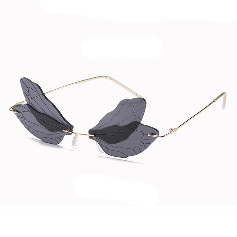 New European and American style sunglasses fashion dragonfly wings rimless sunglasses sunglasses Party sunglasses