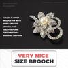 An elegant floral brooch, perfect for wearing to weddings, Christmas parties, or graduation ceremonies.