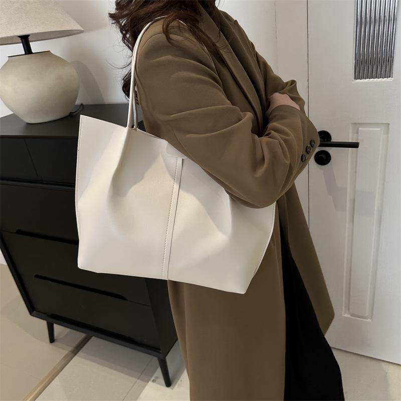 Korean Version of Solid Color Simple Niche Design Versatile Sewing Line Bag Women's Bag Is Popular This Year, Large-capacity Shoulder Armpit Bag