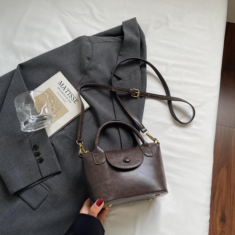 Ретро сумочка женская 2025 новая трендовая модная контрастная сумка через плечо для通勤 и мессенджер, сумка-пельмень