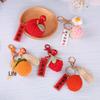Очаровательный вязаный брелок-фрукт: Шерстяные подвески «Хурма и клубника»