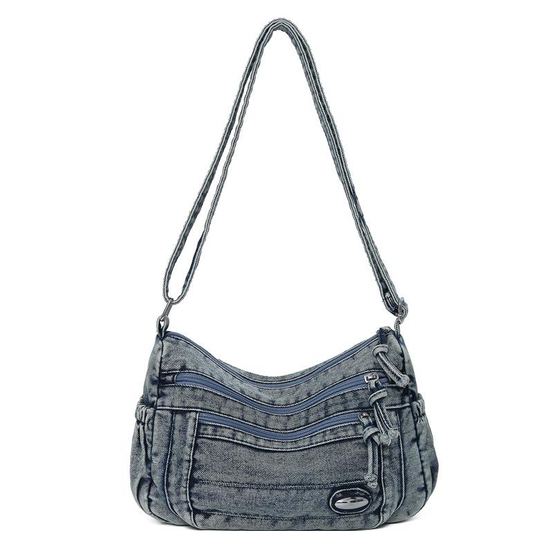 Lightweight and simple literary denim canvas bag, large-capacity retro and old shoulder bag, multi-layer fashionable commuter messenger bag.