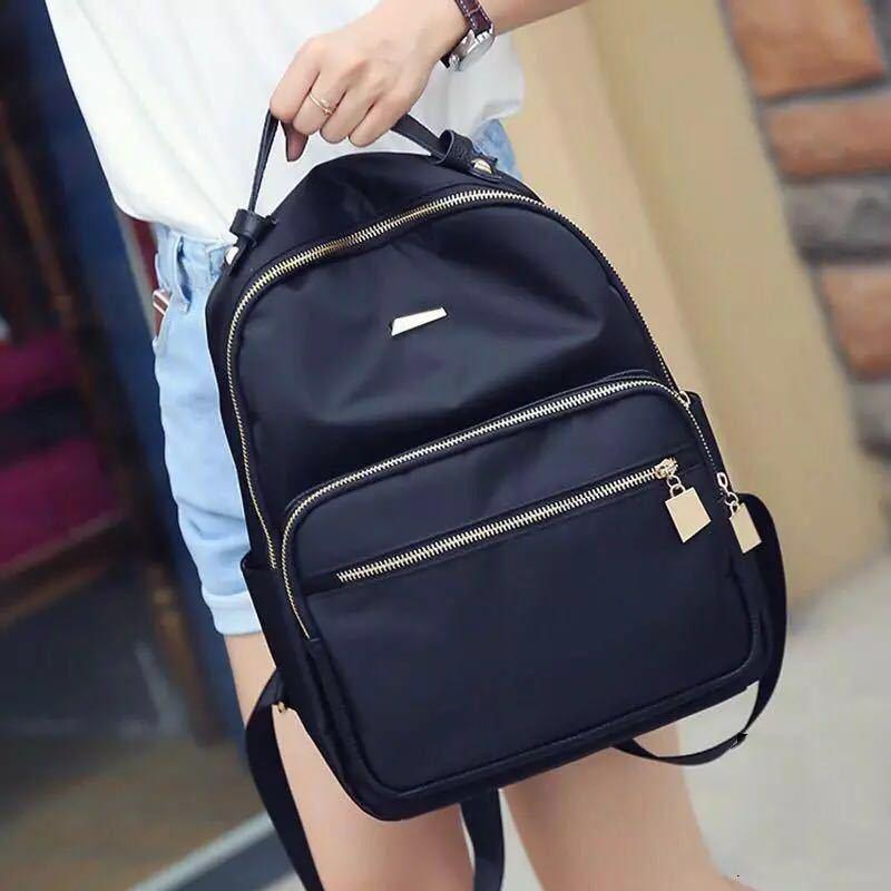 IELGY backpack female Korean version of the trendy Oxford cloth ladies backpack pure color versatile casual waterproof bag