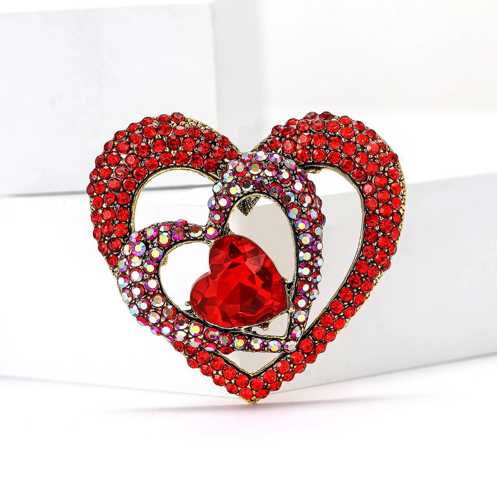 New Fashionable Alloy Rhinestone Hollow Heart Brooch with Elegant Temperament, Fashionable Women's Chest Flower Jewelry