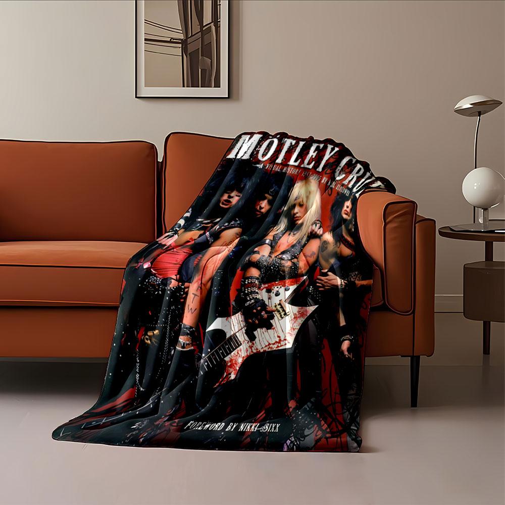 Rock band members in edgy outfits with studded details and instruments. for all seasons blanket lunch break throw gift