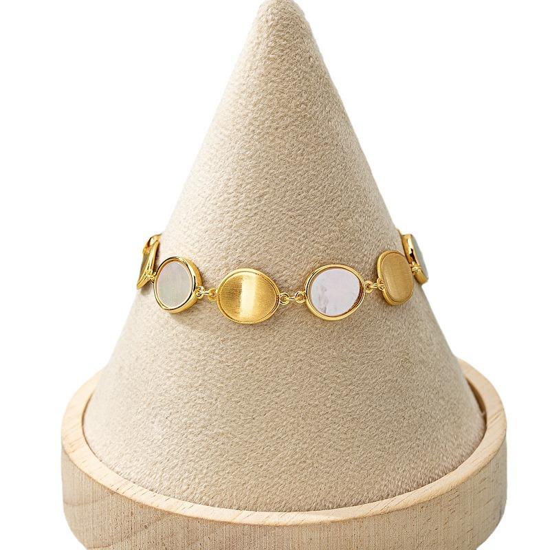 Korean version of fashionable fresh and sweet shell earrings niche brushed bracelet new light luxury simple texture jewelry