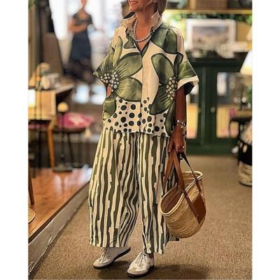 Женский летний комплект из двух частей свободного кроя с цветочным принтом: топ с лацканами и короткими рукавами + брюки с широкими штанинами, повседневный комплект