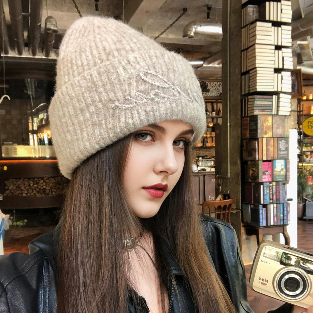 South Korea autumn and winter new solid color versatile trend letter embroidered ear protection wool hat large version showing face small knitted hat