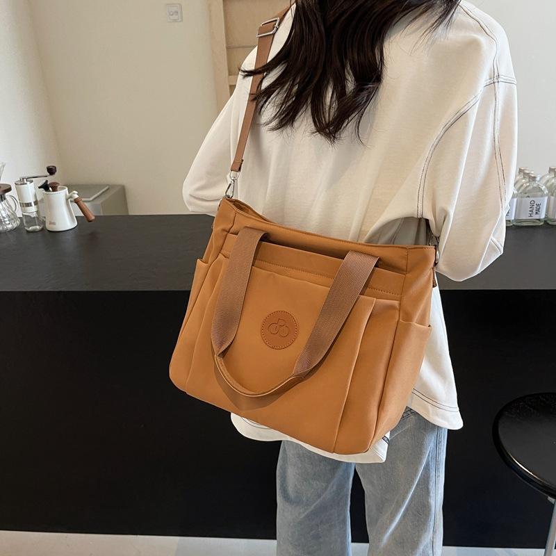 Большая вместительная сумка 2024 года, новая сумка через плечо, женская сумка для поездок на работу, женская сумка в иностранном стиле, повседневная сумка-тоут